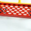 Industrial Ladders showing bottom step of mobile safety step in red