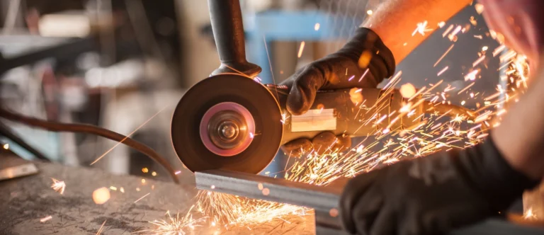 Hot-Work worker using an angle grinder