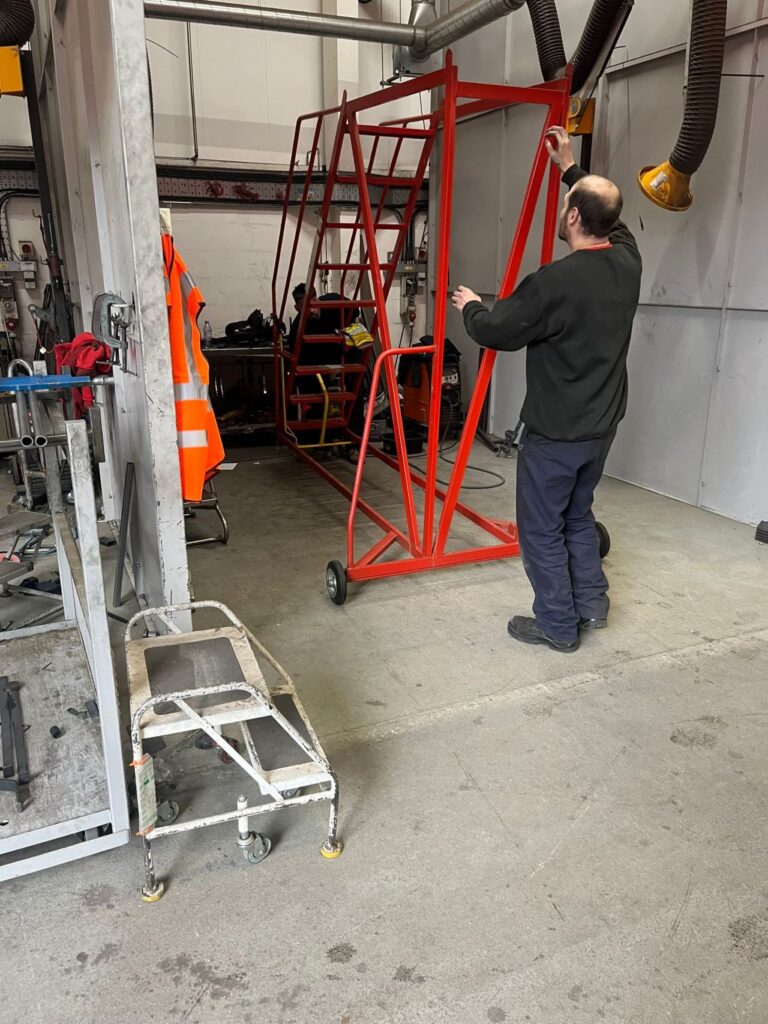 Large warehouse steps being inspected and assembled for a customer