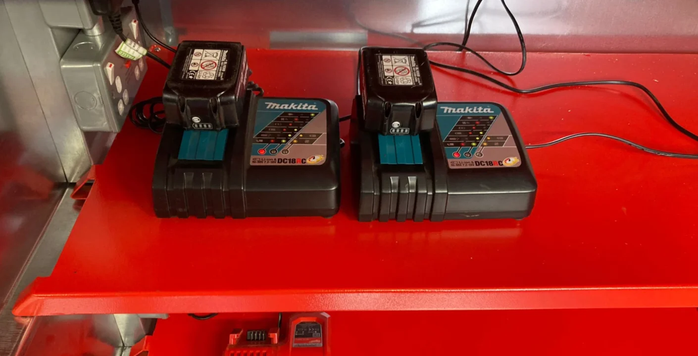 Li-ion batteries charging on an armorgard powerstor shelf