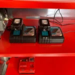 Li-ion batteries charging on an armorgard powerstor shelf