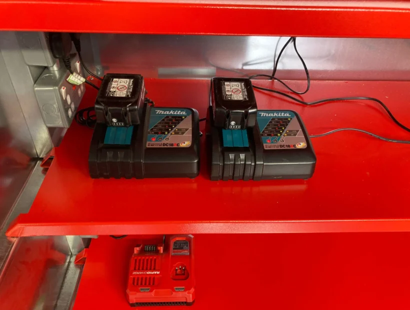 Li-ion batteries charging on an armorgard powerstor shelf